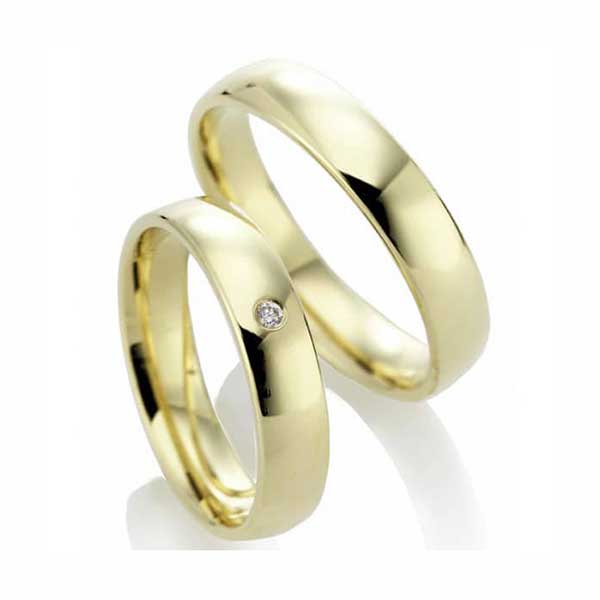geel-gouden-gladde-trouwringen-diamant-in-briljantslijpsel-Circles Trouwringen-Zwijndrecht
